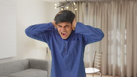 Young-Indian-man-shouting-and-screaming