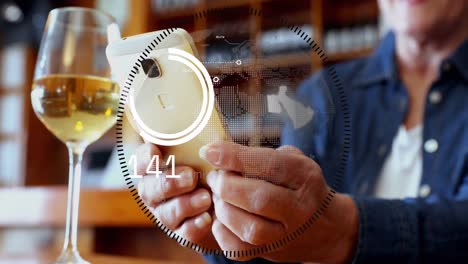 Animation-of-data-processing-and-globe-over-hands-using-smartphone