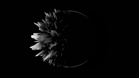 black and white ferrofluid deforming organic blob with copy space