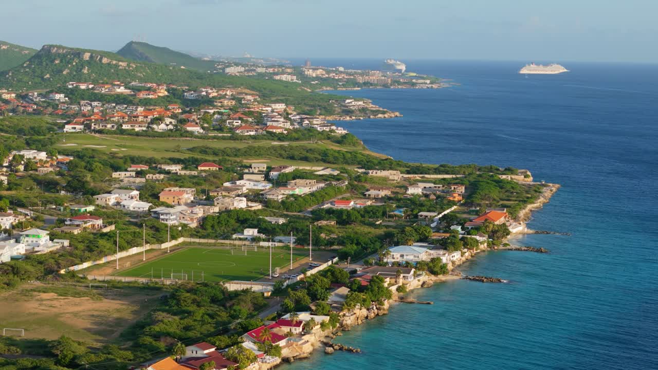 Panoramic aerial parallax around football field in Boca Sami near coast of Curacao