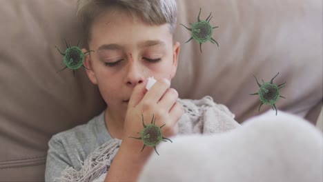 animación de células de virus sobre un niño caucásico estornudando en la cama