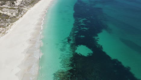 aerial footage of mindarie beach showing off the clear ocean water and white sands of perth western australia