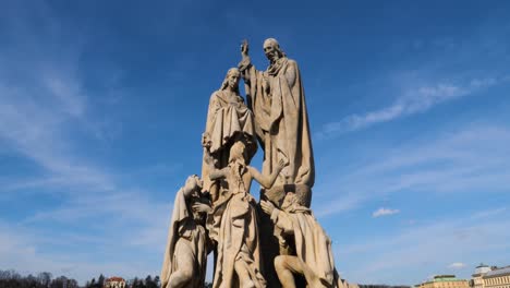 statues of saints cyril and methodius on charles bridge in prague, czech republic