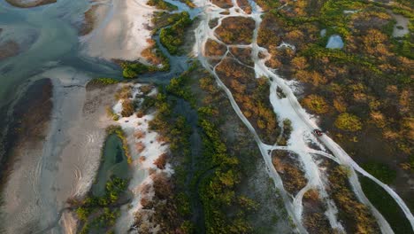 drone view of buggy tour through coastal dunes and lagoons, jericoacoara, cear?