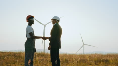 business deal at wind farm