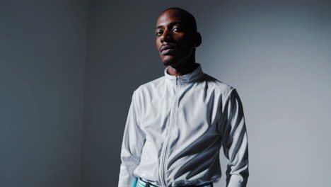 portrait of a man in a grey jacket