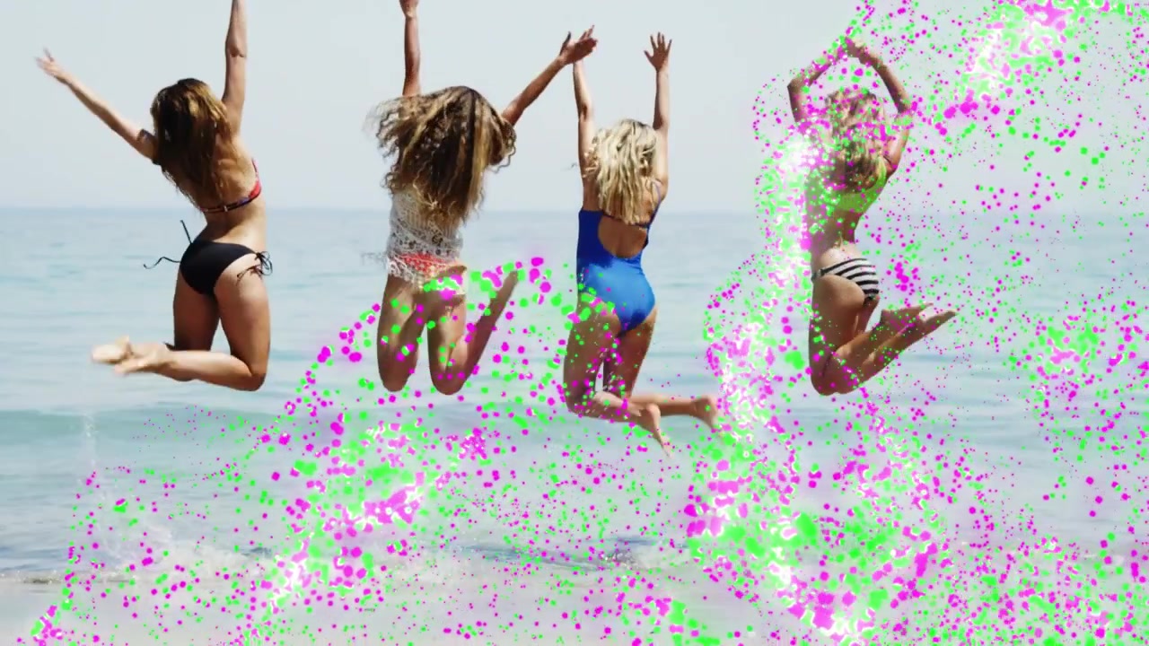 Four women stepping into surf as pink-green particles entering from right jumping splashing for ads