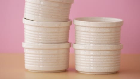 stack of white ceramic cups