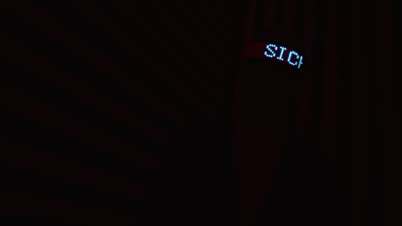 Digital Display and VR Headset in Red and Black Lighting