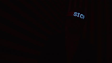 digital display and vr headset in red and black lighting