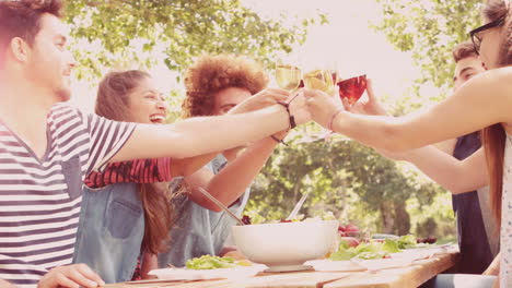 in slow motion happy friends in the park having lunch