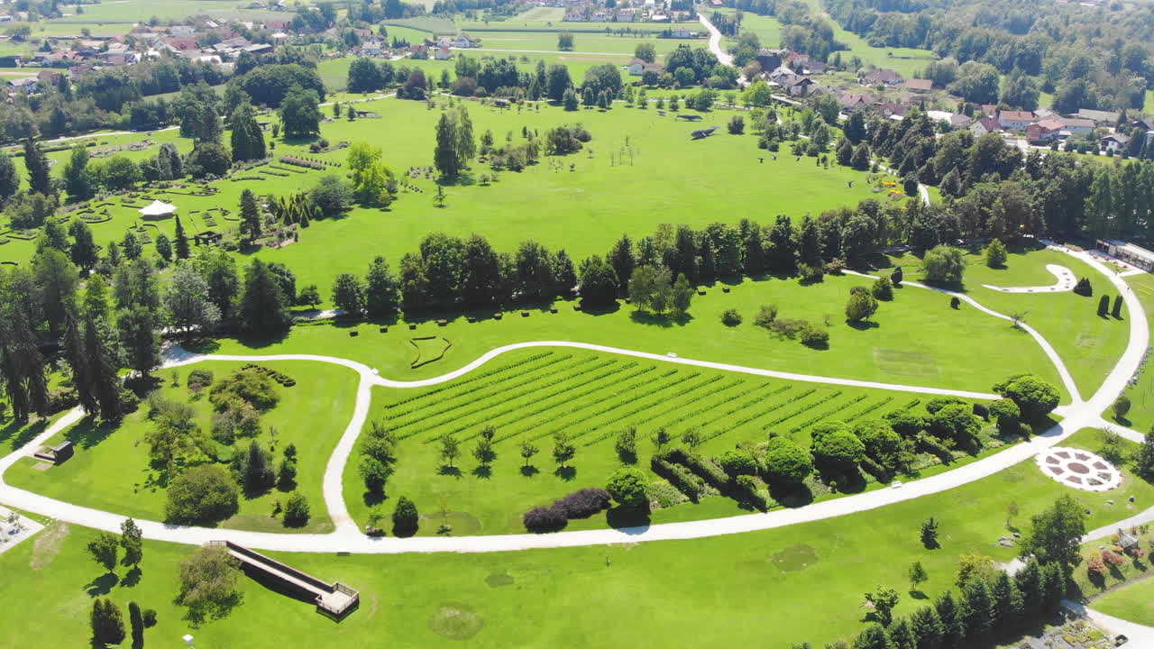 Aerial Panorama Over The Volcji Potok Arboretum On Sunny Day