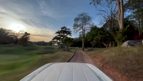golf course sunset view from golf cart