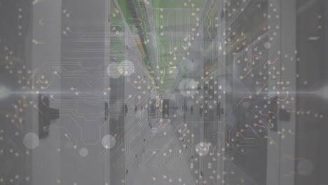 animation of white spots and microprocessor connections against computer server room