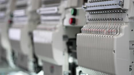 Closeup-Of-Multi-head-Computer-Embroidery-Machine-At-Work-In-A-Garment-Factory