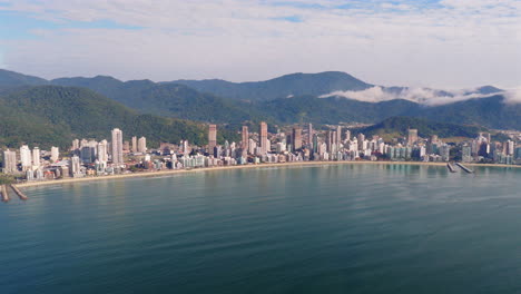 Breathtaking aerial view of Itapema in Santa Catarina, Brazil, revealing a stunning cityscape blending with tranquil Atlantic ocean waters