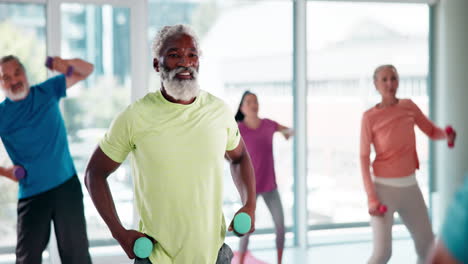 senior fitness class with dumbbells