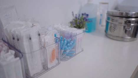 organized medical supplies in clear containers