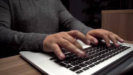 a person using laptop at night