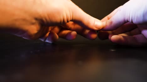 an american nickel coin being spun