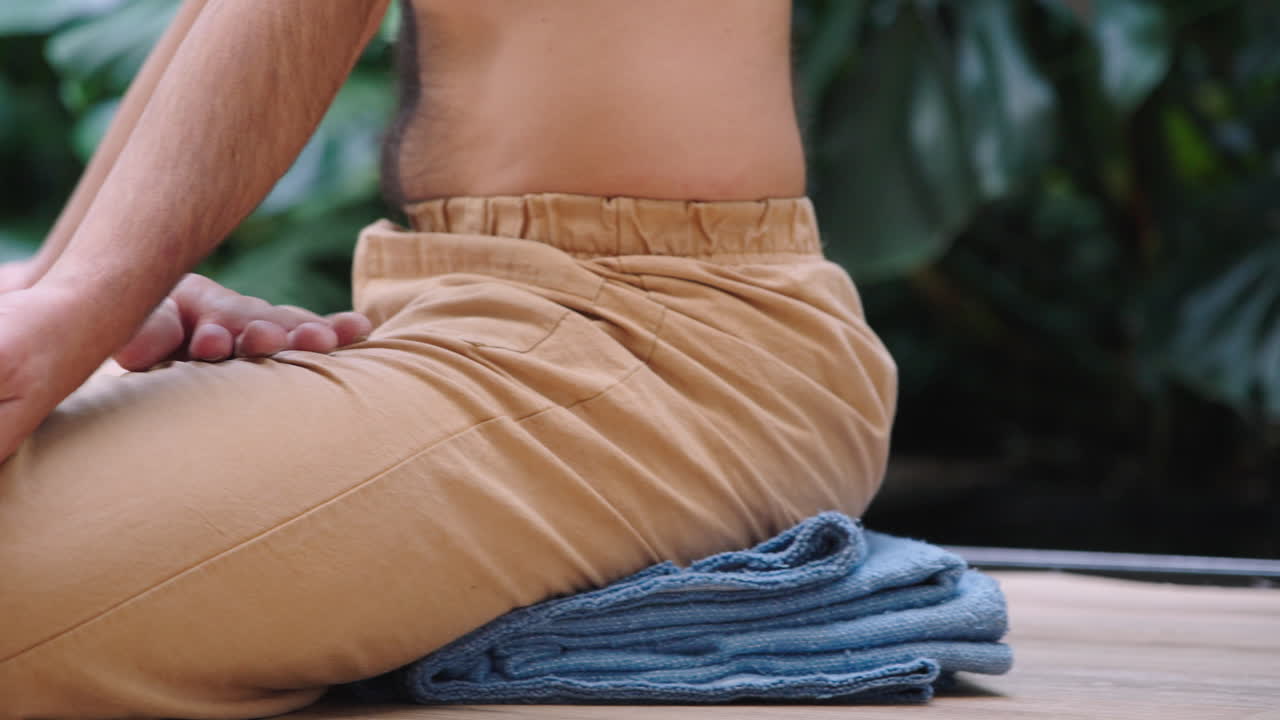 Close-up of Person Meditating with Hands in Mudra Outdoors