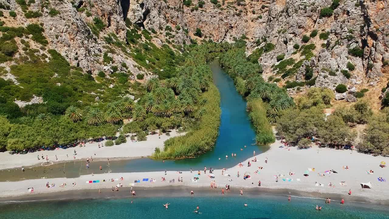 Aerial footage of the heavenly, serene river and lagoon known as Preveli beach