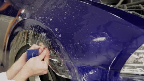 applying paint protection film to a car