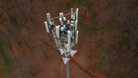 Aerial-Top-Down-Shot-of-Cell-Phone-Tower-in-Forest