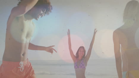 people dancing on beach with colorful bokeh lights animation