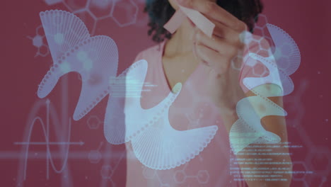 person holding paper with abstract dna animation over scientific data background