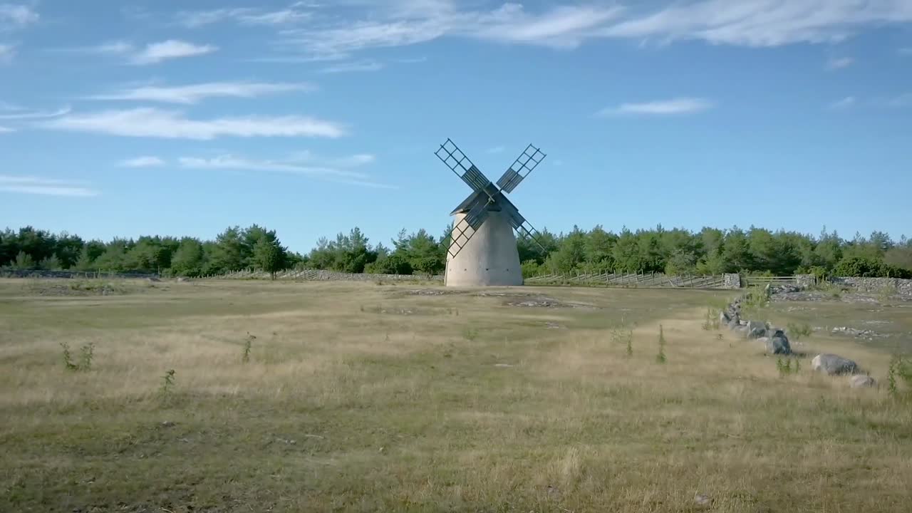 Hyperlapse passing a traditional, old windmill on the island of Gotland. Sweden