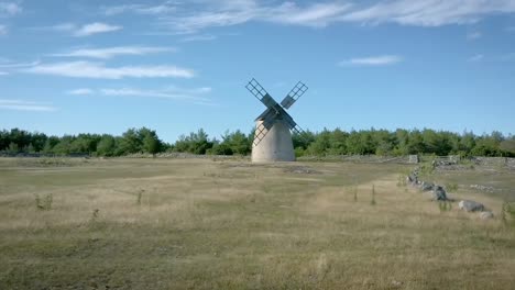 hyperlapse passing a traditional, old windmill on the island of gotland. sweden