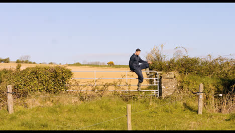 Cattle-farmer-walking-towards-barn