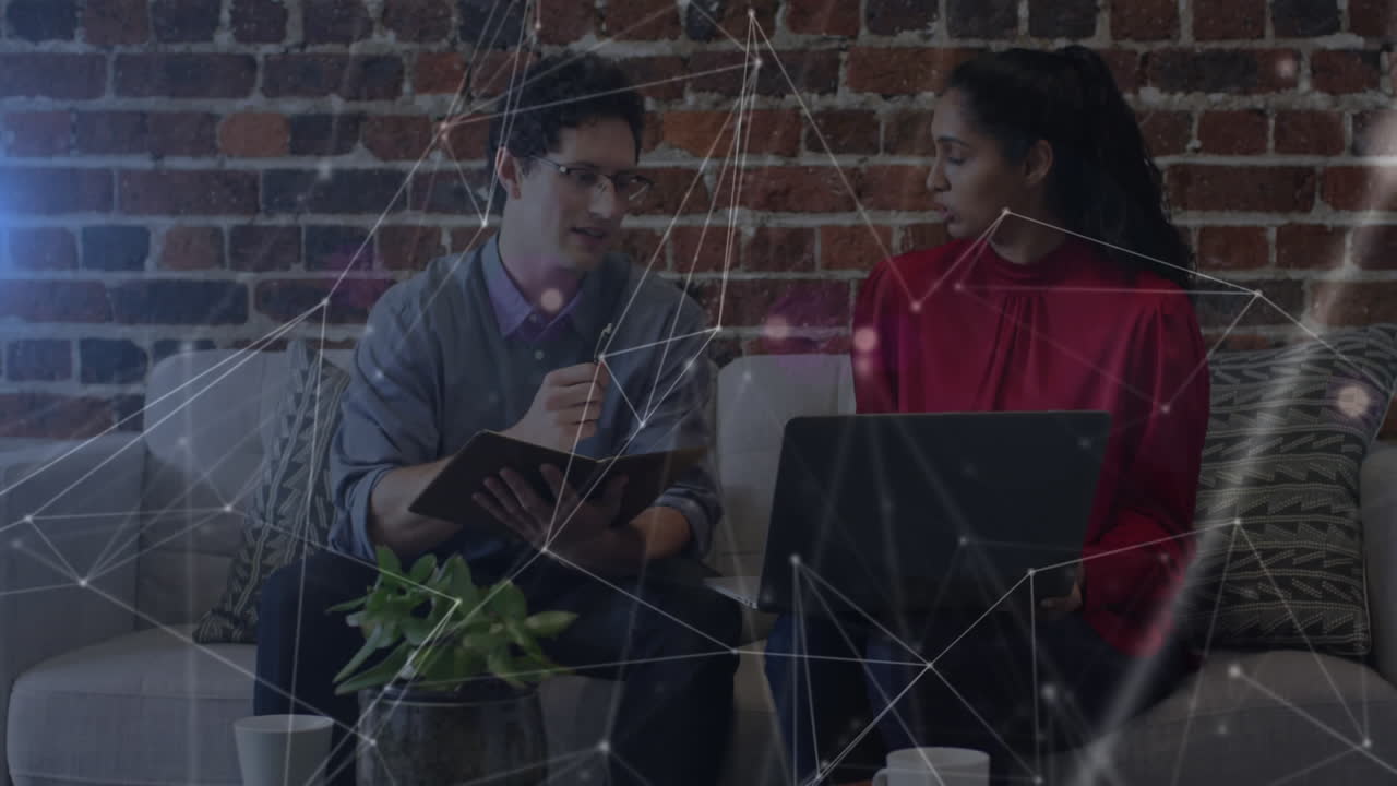 Network of connections against diverse office colleagues discussing together at office