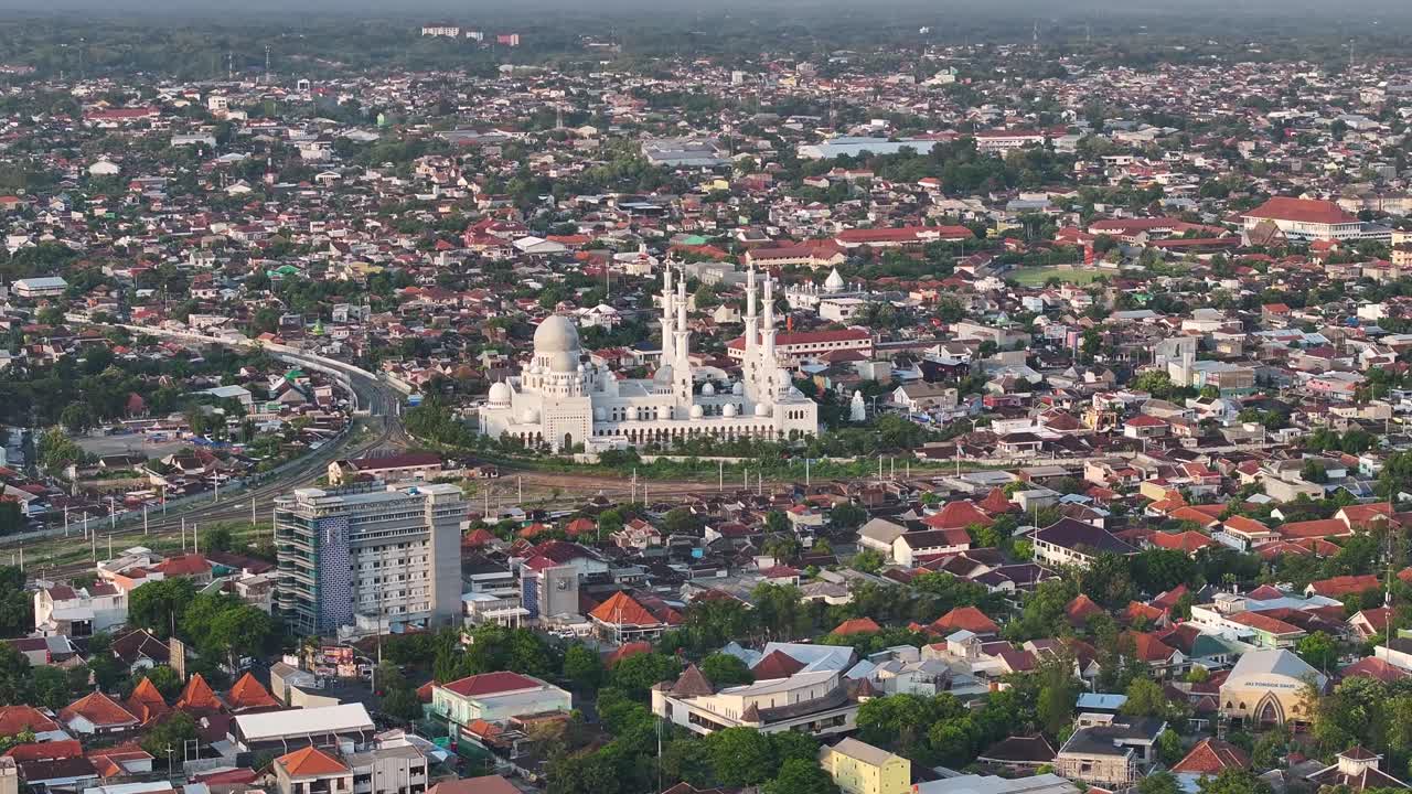 Majestic Great Mosque in Surakarta, Indonesia. Aerial birds eye of big Indonesian city in Central Java.