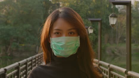 woman wearing mask in park