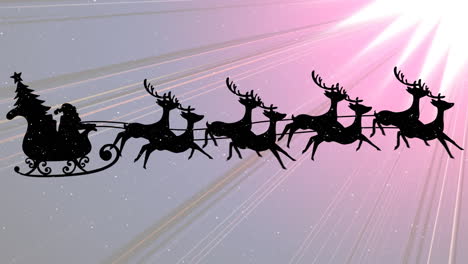 snow falling on santa claus in sleigh being pulled by reindeers against purple light trails