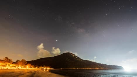 lantau island night sky milky way shining star lights over hong kong mountain ocean seascape glowing coastline