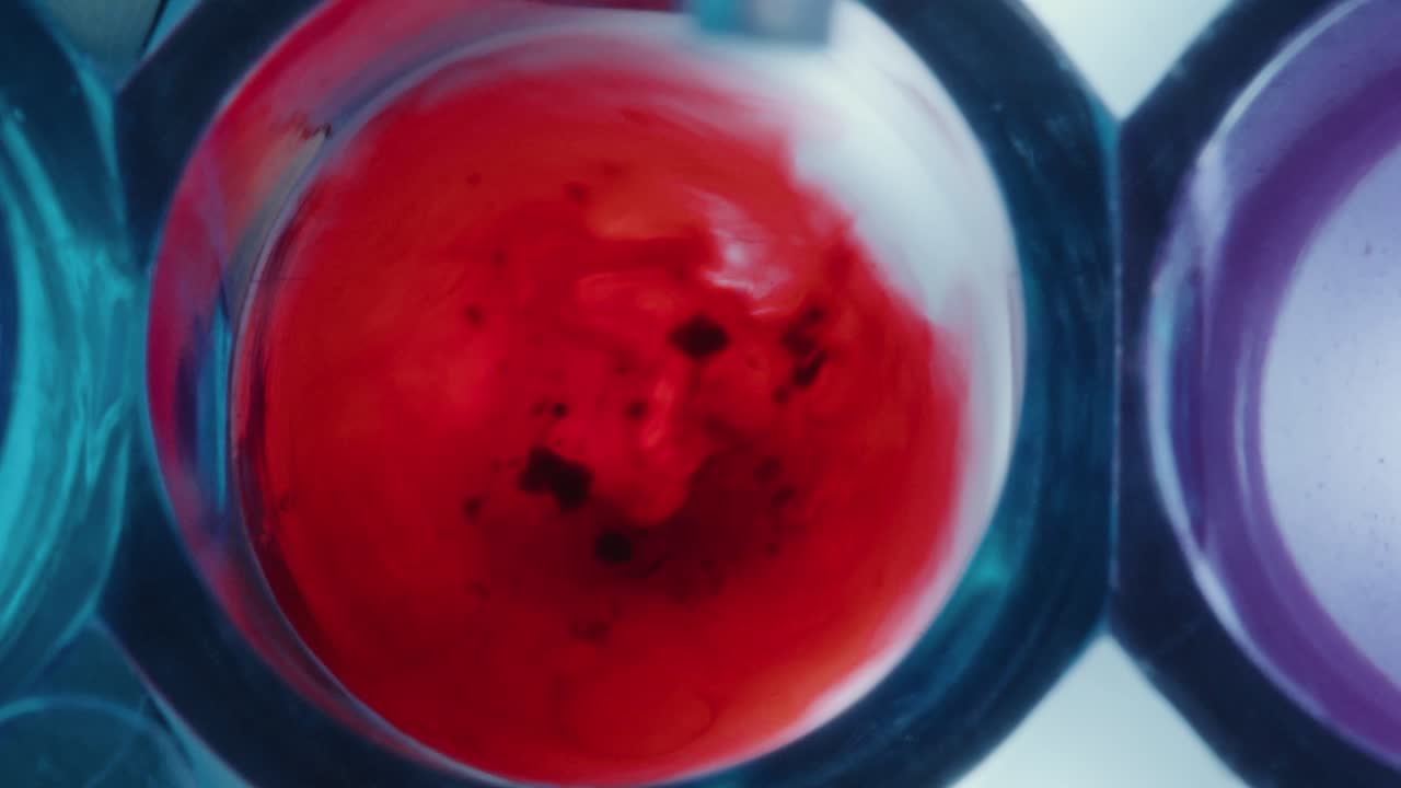 Pipette Adding Transparent Liquid to Blood in Glass Test Tube