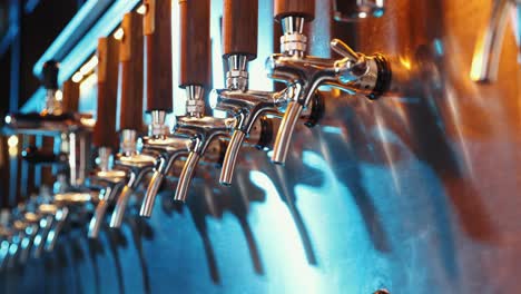 close-up of beer taps