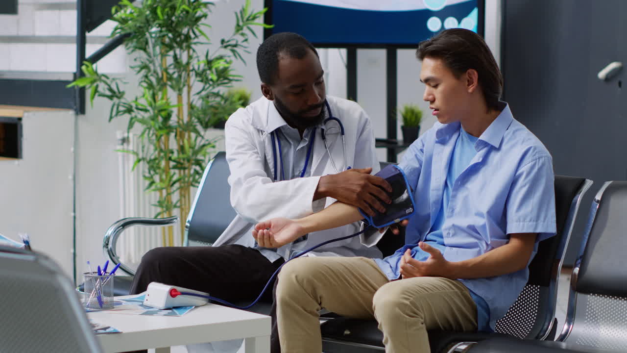 Doctor Checking Patient's Blood Pressure