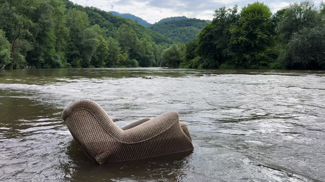 Armchair in a flooded river