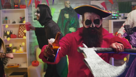 bearded man dressed up like a pirate celebrating halloween