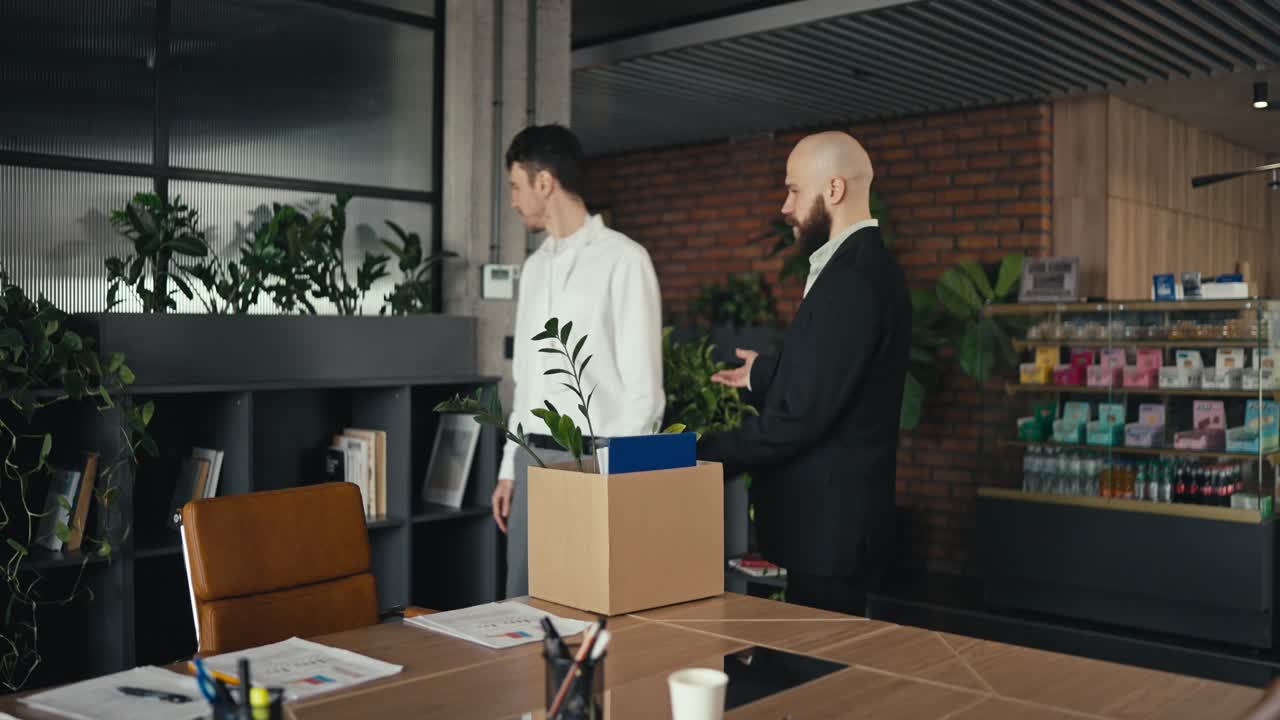 Employee leaving office with belongings