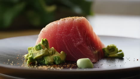 gourmet tuna dish with avocado and spices