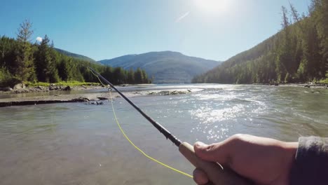 man fishing in the river 4k