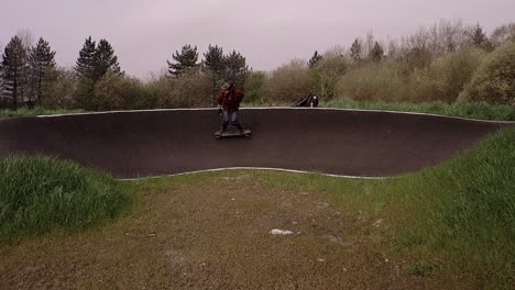 Eboarding-footage-around-a-BMX-pump-track