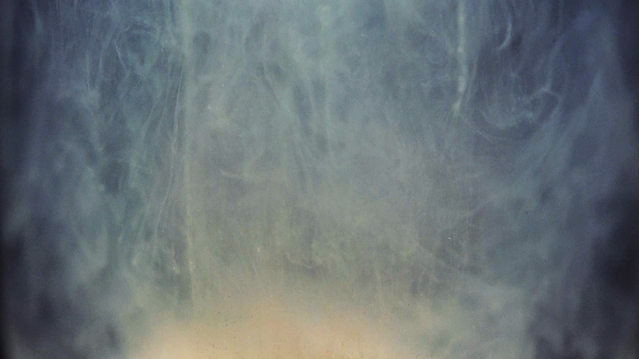 Slowmotion shot showing paint floating in water. Shot with the Sony a7iii