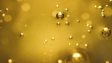 Fondo-De-Ciencia-O-Arte-Abstracto-Con-Burbujas-De-Oro-En-Aumento