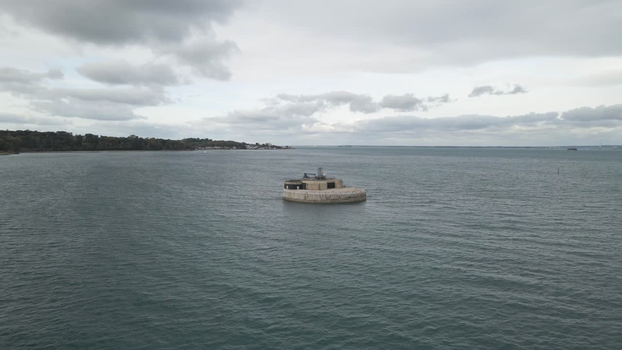 Aerial view St Helens Fort, sea fort in the Solent close to the Isle of Wight, was built as result of the Royal Commission on the Defence of the United Kingdom of 1859, Drone rotating to the right